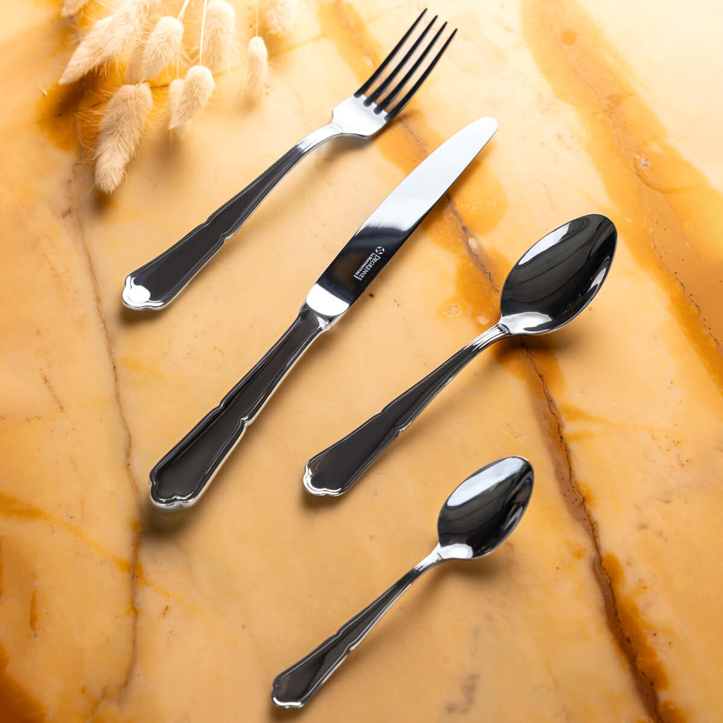 CONTOUR MIRROR FINISH Table knife, hollow handle, serrated