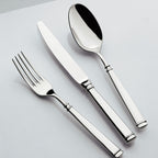 ABSOLU MIROIR Couteau de table manche orfèvre lame unie